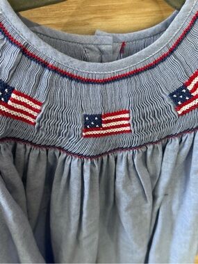 Girls Light Blue Smocked Top with Flag Embroidery